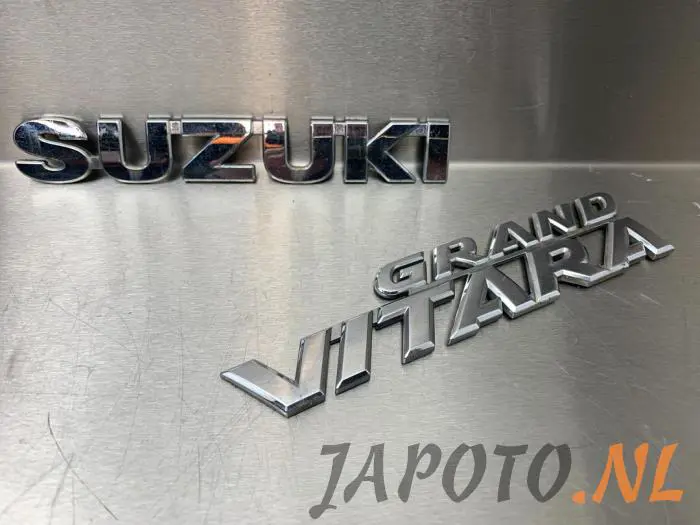 Emblema Suzuki Grand Vitara