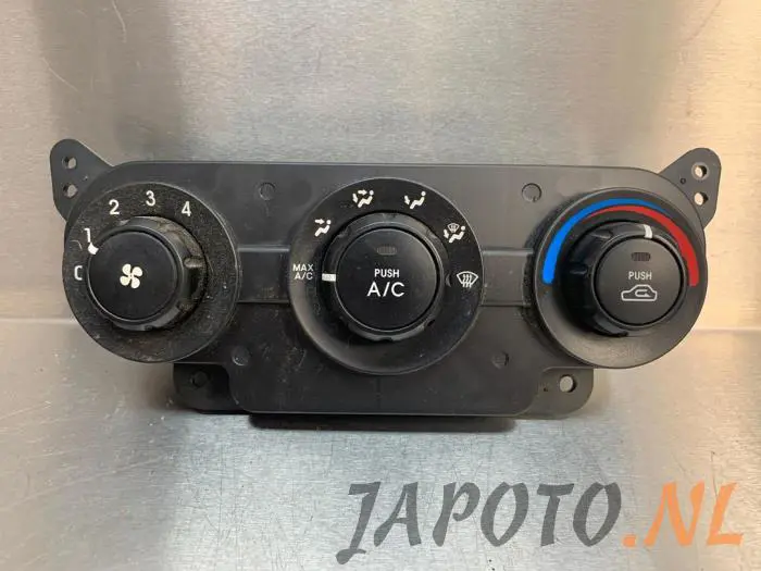 Panel de control de calefacción Kia Cerato