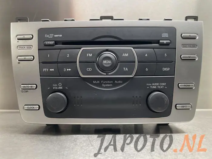 Reproductor de CD y radio Mazda 6.