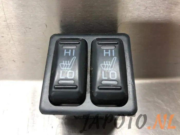 Interruptor de calefactor de asiento Mitsubishi Outlander