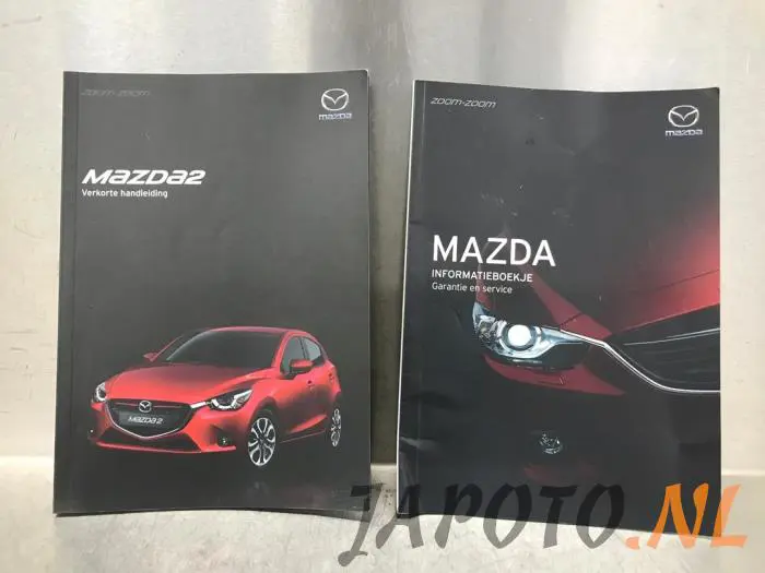 Instrucciones(varios) Mazda 2.